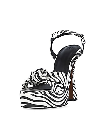360 degree animation of product White zebra print knot detail platform heels frame-23