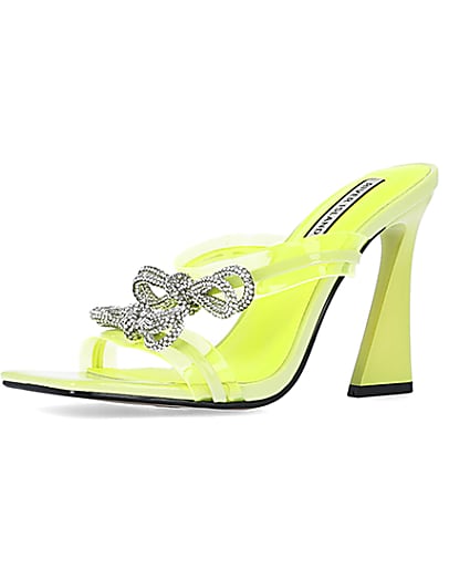 360 degree animation of product Yellow bow detail heeled mules frame-1