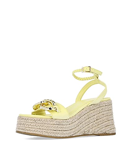 360 degree animation of product Yellow chain detail flatform wedges frame-1