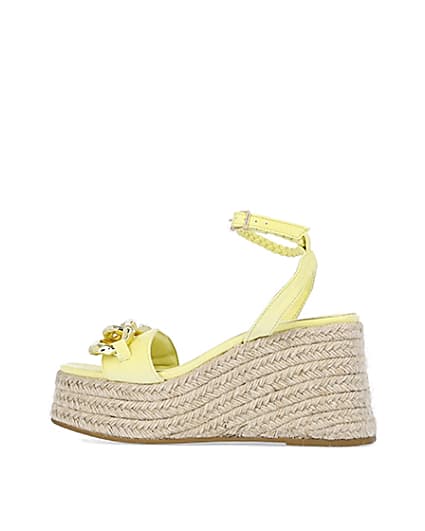 360 degree animation of product Yellow chain detail flatform wedges frame-4