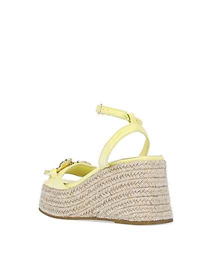 360 degree animation of product Yellow chain detail flatform wedges frame-6
