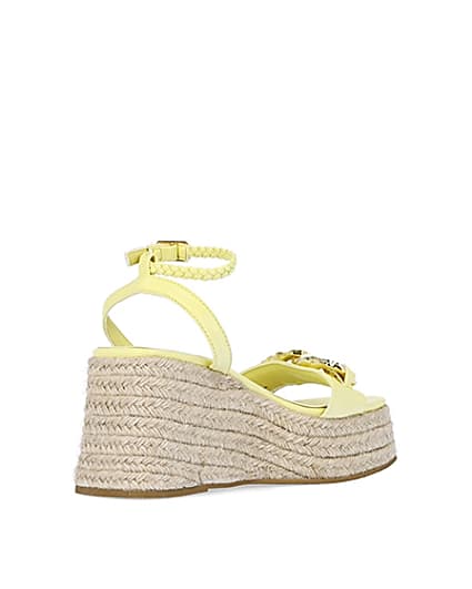 360 degree animation of product Yellow chain detail flatform wedges frame-12