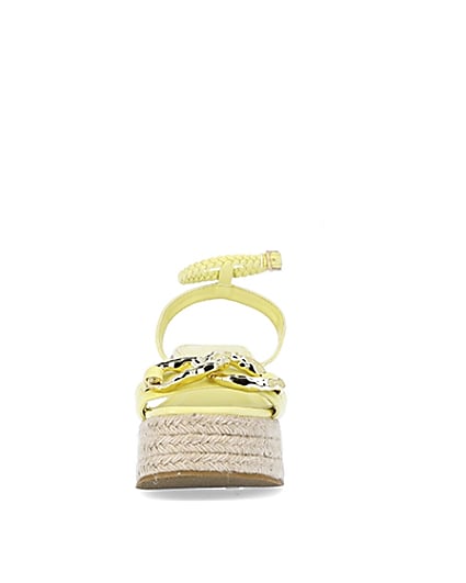 360 degree animation of product Yellow chain detail flatform wedges frame-21