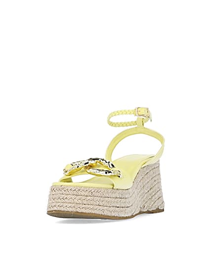 360 degree animation of product Yellow chain detail flatform wedges frame-23