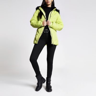 yellow puffer jacket with fur hood