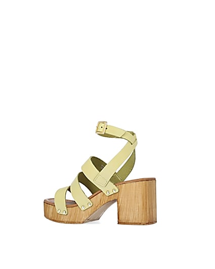 360 degree animation of product Yellow leather platform heeled sandals frame-5