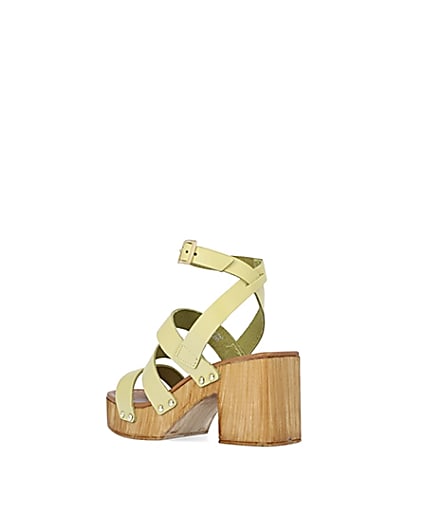 360 degree animation of product Yellow leather platform heeled sandals frame-6