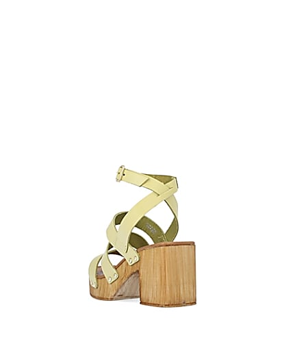 360 degree animation of product Yellow leather platform heeled sandals frame-7