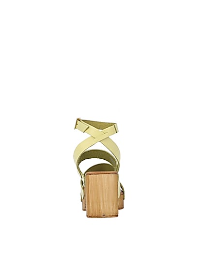 360 degree animation of product Yellow leather platform heeled sandals frame-9