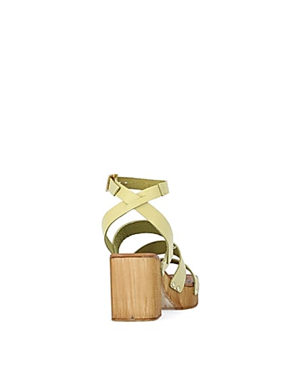 360 degree animation of product Yellow leather platform heeled sandals frame-10