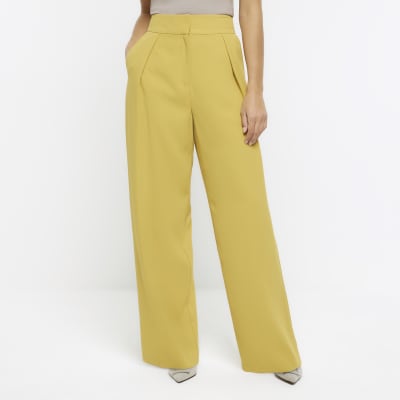 Yellow pleated wide leg trousers | River Island