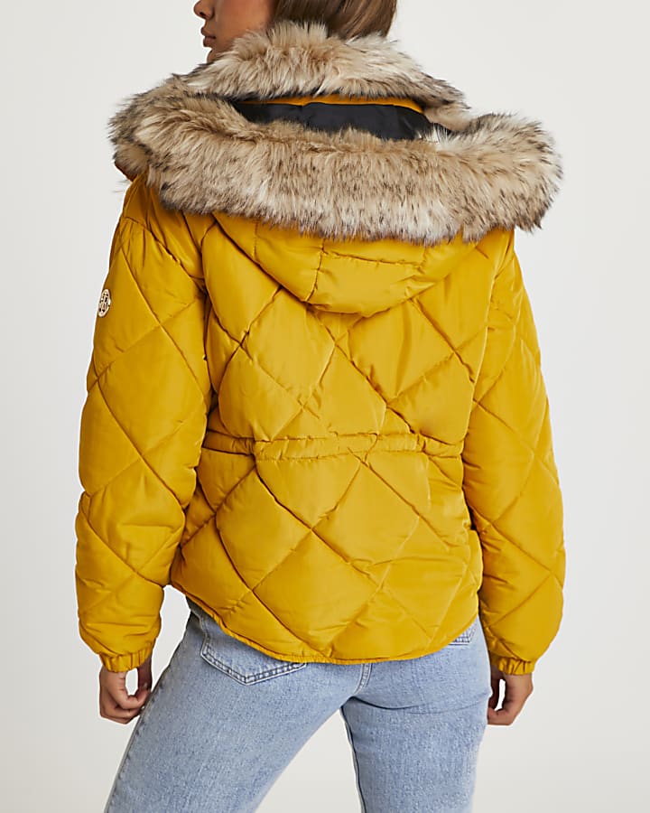 Yellow quilted puffer coat