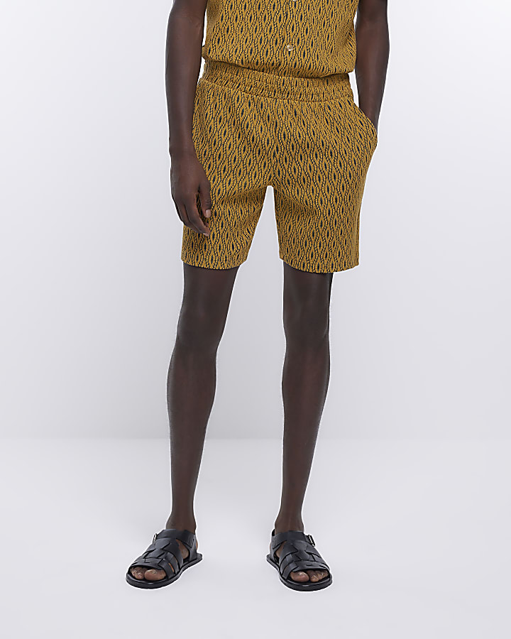 Yellow slim fit textured printed shorts