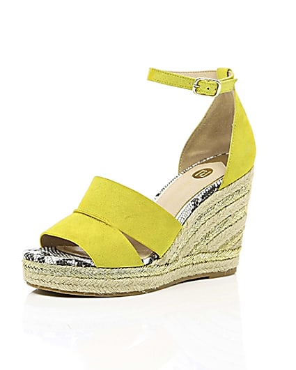 360 degree animation of product Yellow strappy espadrille wedges frame-0
