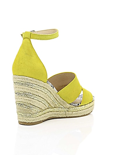 360 degree animation of product Yellow strappy espadrille wedges frame-13