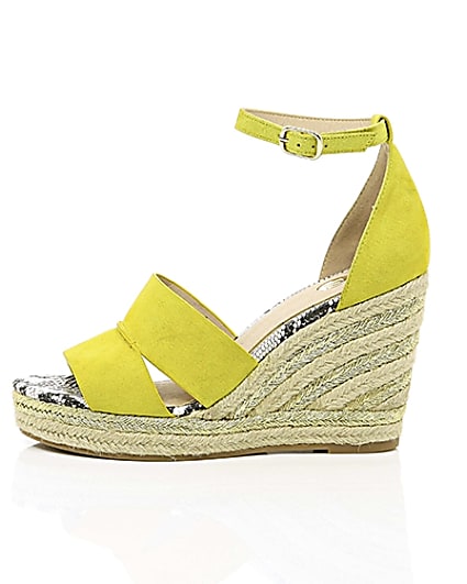 360 degree animation of product Yellow strappy espadrille wedges frame-22