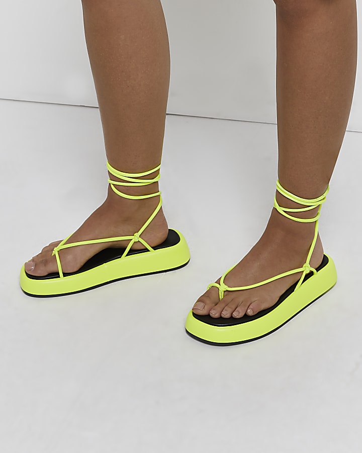 Yellow strappy flatform sandals