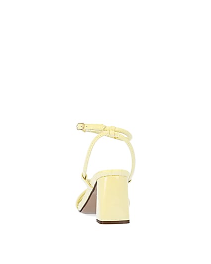 360 degree animation of product Yellow strappy heeled sandals frame-9