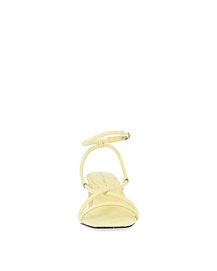 360 degree animation of product Yellow strappy heeled sandals frame-21