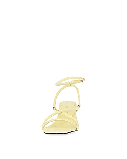 360 degree animation of product Yellow strappy heeled sandals frame-22