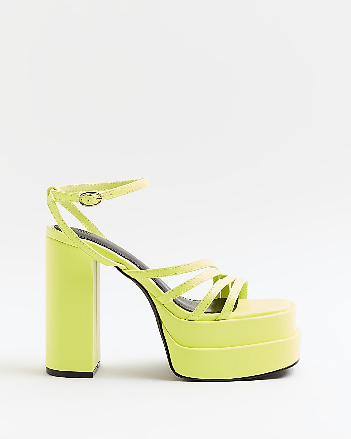Yellow strappy platform heeled sandals